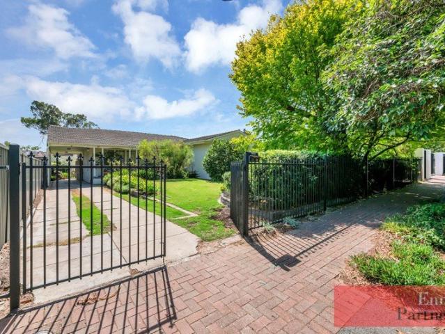 Timeless 1960s Solid Brick Home on Expansive 1349sqm Approx. with Tennis Court and pool!
