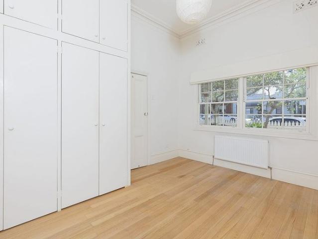 Timeless Terrace charm in a coveted Fitzroy North Llocation