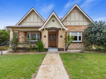 Timeless Tudor Charm with Modern Comforts on a Corner Allotment