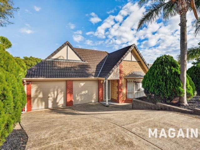 Timeless Tudor Charm Meets Modern Family Living A Hidden Gem in Woodcroft!
