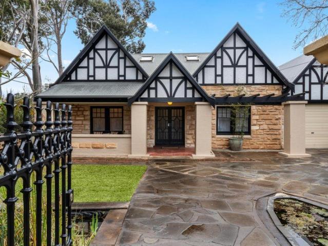 Timeless Tudor Elegance. Contemporary Family Living. An Address of Enduring Prestige