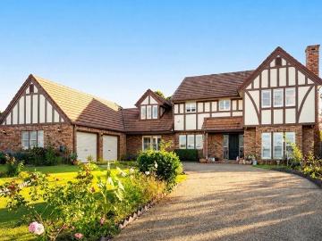 Timeless Tudor Elegance on a Rare 1,234sqm Family Estate