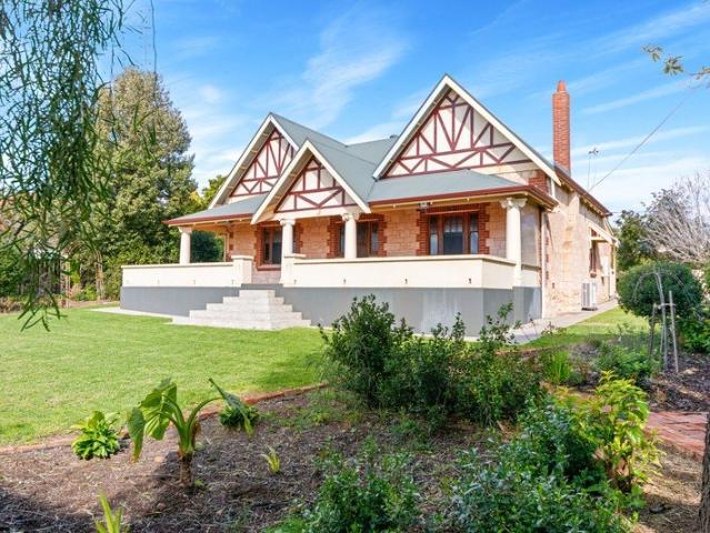 Timeless Tudor Elegance on a Rare 2,096m² Corner Allotment