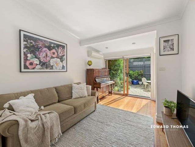 Timeless Victorian Charm with a Private Garden Oasis