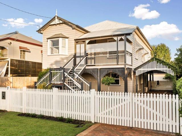 Timeless Bayside Queenslander with Space, Style and a Resort Pool