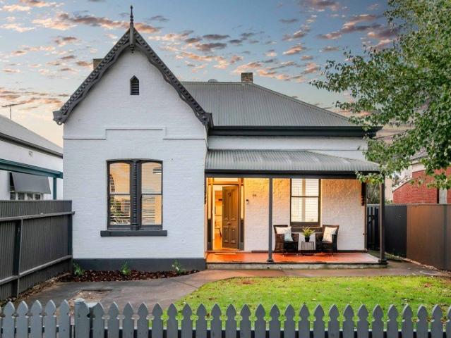 Timeless c1910 Cottage with Modern Comforts in Prime Mile End Location