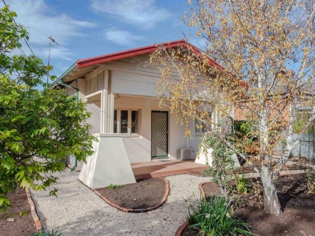 Timeless Character Charm in a Premier City Fringe Setting