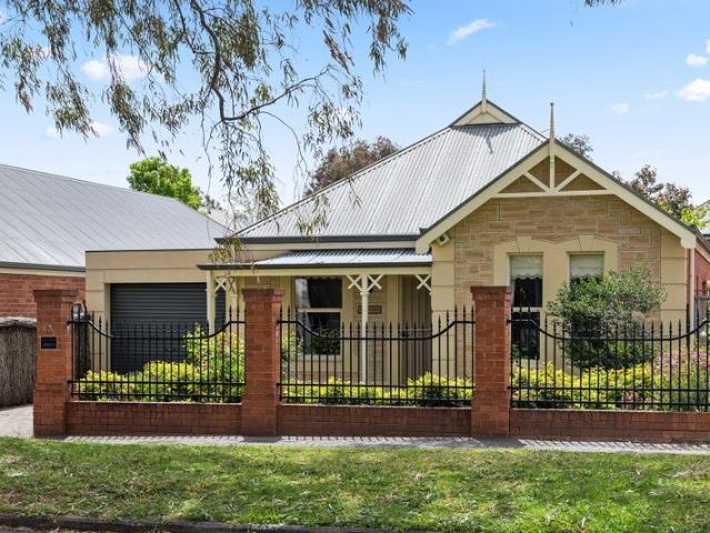 Timeless Character and Surprisingly Spacious Living in a Prized Glenside Setting