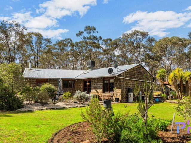 TIMELESS CHARACTER & LIFESTYLE OPPORTUNITY ON 12 ACRES