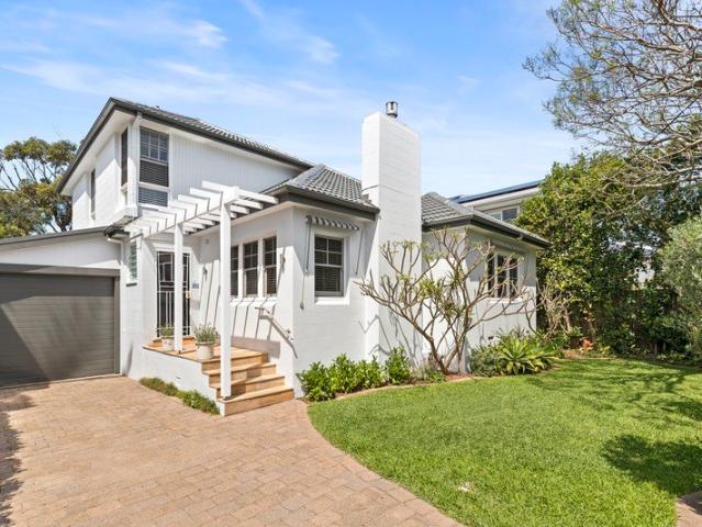 Timeless Character Meets Modern Comfort in a Blue Chip Beachside Enclave