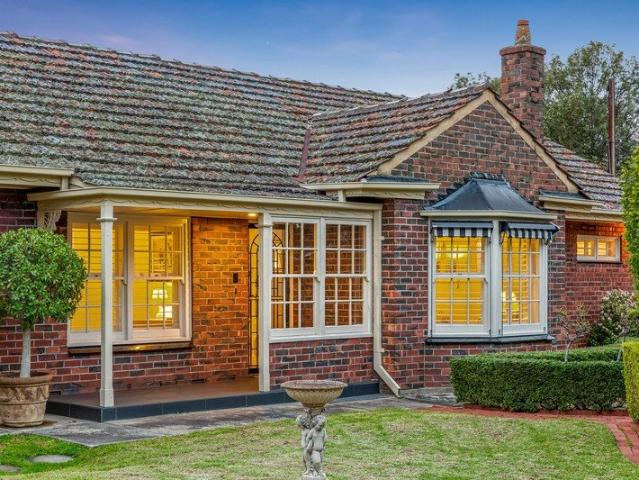 Timeless Charm with Contemporary Comfort on a Coveted Corner Allotment