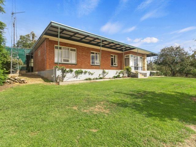 Timeless Charm with Elevated Views on 1.99ha