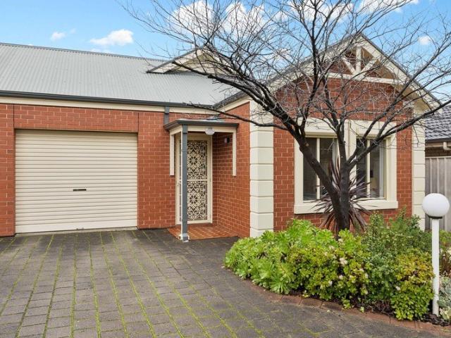 Timeless Charm and Effortless Living in a Premier Riverside Pocket