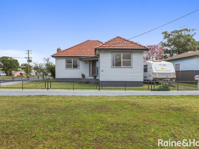 Timeless Charm, Endless Potential Corner Block Opportunity with Room to Grow