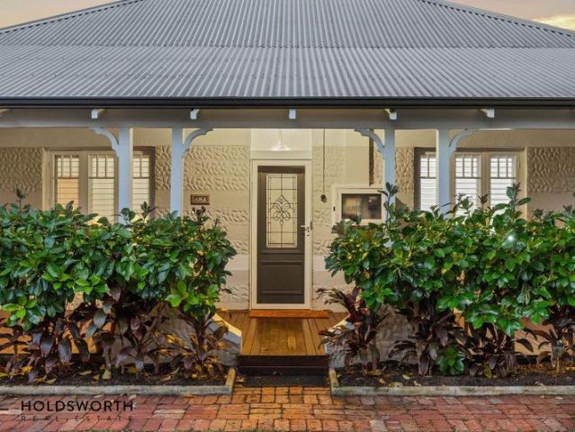 Timeless Cottage Charm with Modern Family Luxury
