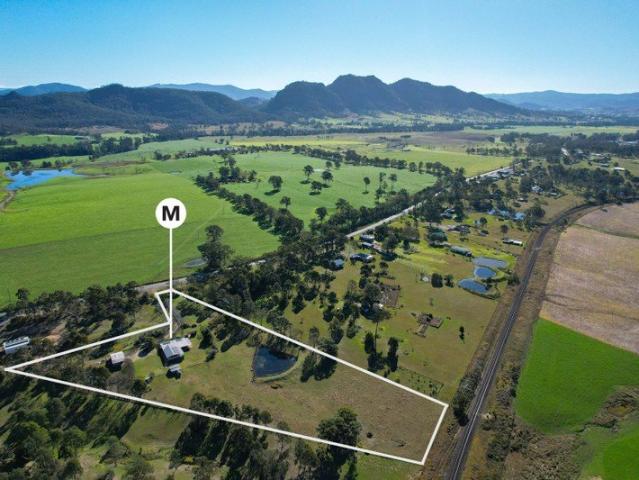 Timeless Country Living on 5.5 Acres with Sweeping Rural Views
