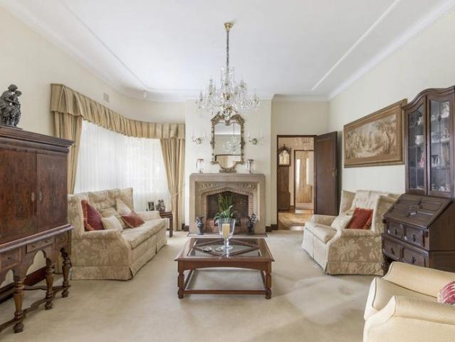 Timeless Double Brick Charm in a Prestigious East Side Setting !