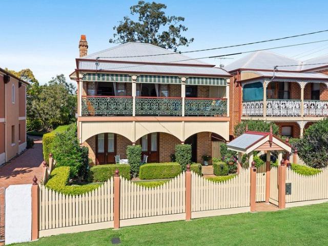 Two Street Access and Timeless Elegance with Bay Views