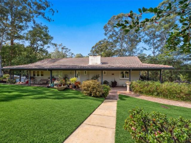 Timeless Family Home on a Prized Corner Block !