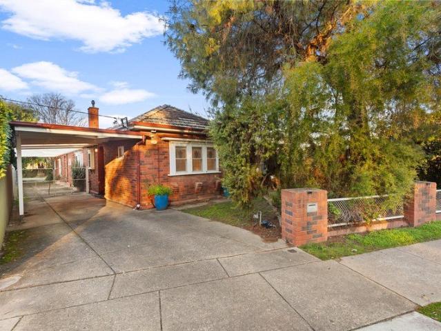TIMELESS FAMILY LIVING IN PREMIER ADDRESS