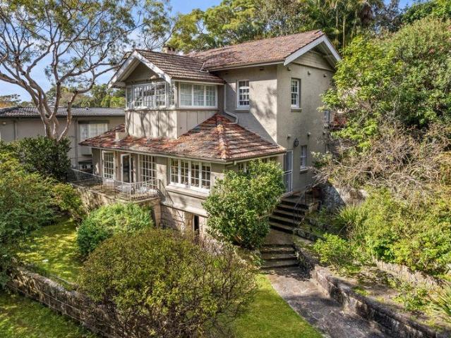 Timeless Family Residence with Water Views and Enormous Potential
