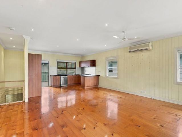 Timeless Queenslander Charm. Elevated Modern Living