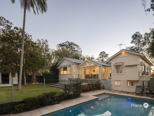 Timeless Queenslander Character and an Idyllic Riverside Family Life