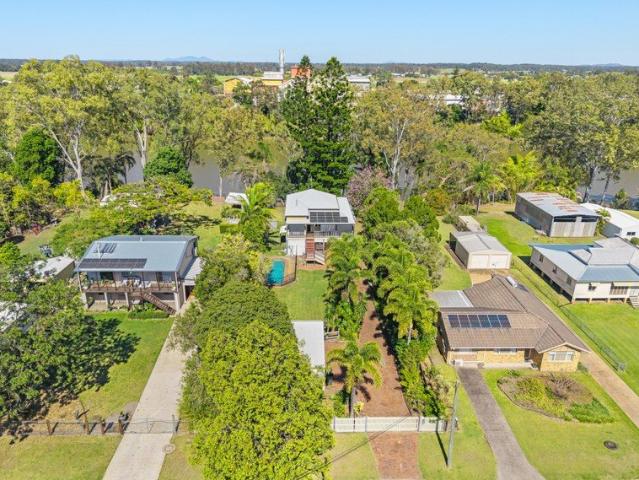 Timeless Riverfront Queenslander with Space, Character and Endless Possibilities