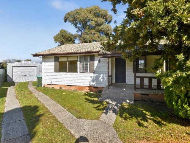 Tidy and Affordable Home in Convenient Orange Location
