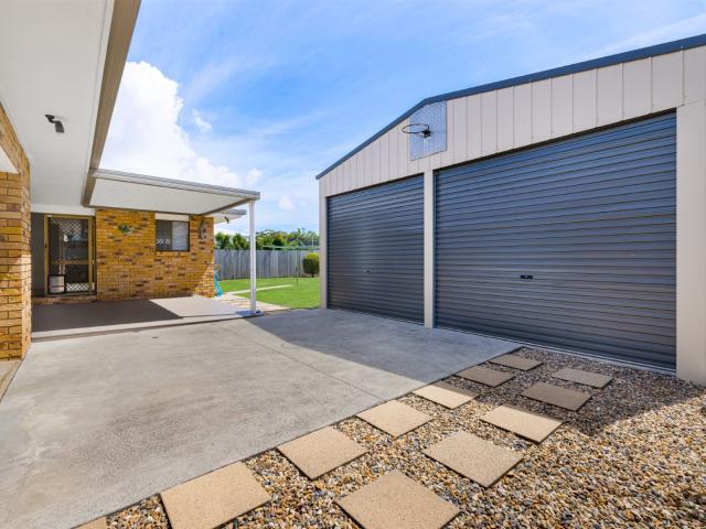 Tidy brick and tile home, plus hobby shed