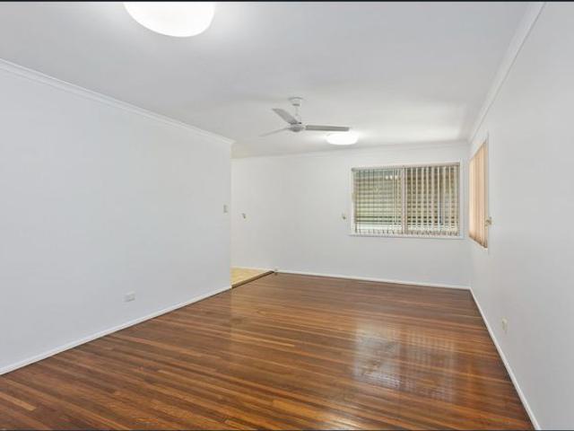 TIDY HOME WITH SPACIOUS YARD IN GREAT LOCATION
