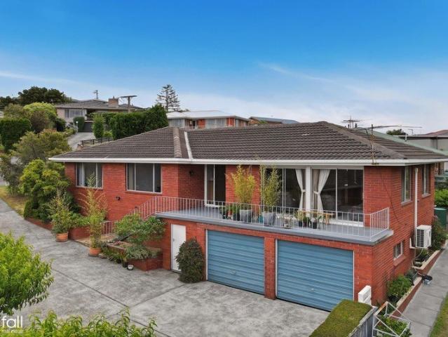 Tidy Home with Stunning Water Views, Double Garage and Rumpus Room