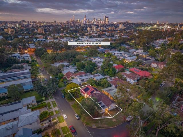 Tidy Post War home on two lots at coveted locale