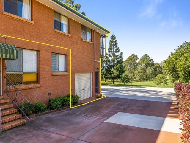 Tidy Three Bedroom Unit with Stunning Golf Course Views!