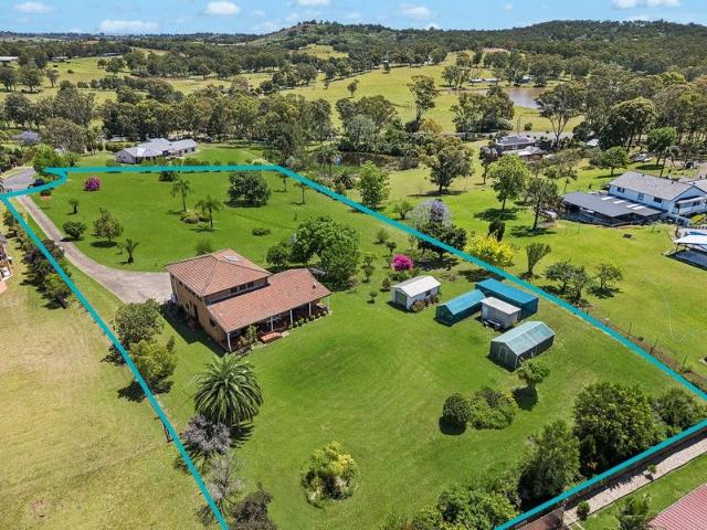 Tightly held home on acreage with superb potential