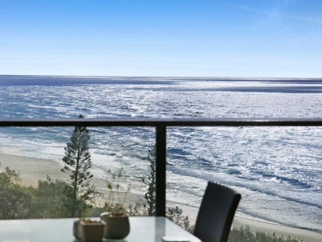 Tightly Held North East facing 1 brm apartment with never ending ocean,city and coastal views