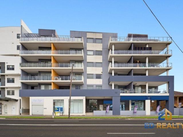 TILED LIVING AND DINING AREA WITH UNBLOCKED BALCONY VIEW