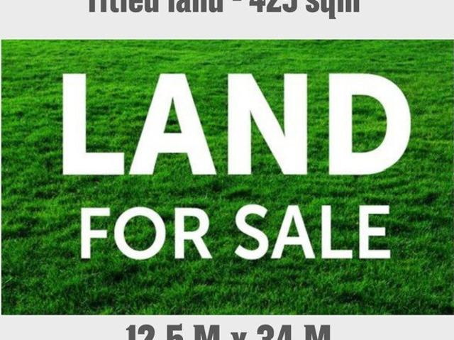 Titled lot ready to build Prime location