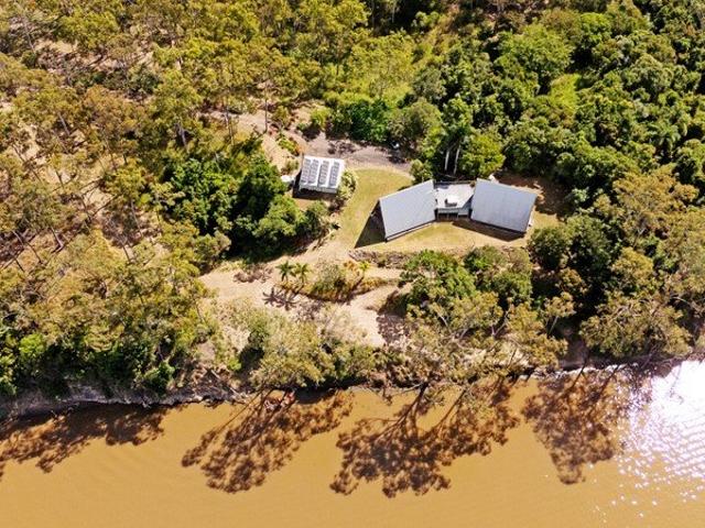 Acreage Riverfront Retreat Your Dream Awaits!