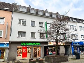 TOP Faktor: Ertragstarkes Wohn Geschäftshaus in Bestlage Fußgängerzone mit solventem Ankermieter, 6 Wohneinheiten und 9 Garagen