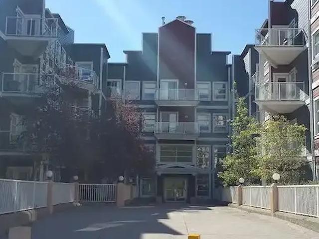 Top Floor 1 Bedroom Furnished Executive Condo No Parking — 1 Bedroom Condo Unit