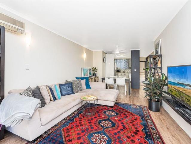 Top floor 2 bedroom unit with 2 parking spaces