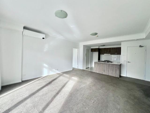 Top Floor 2 Bedroom Unit with Great Views and Two Balconies