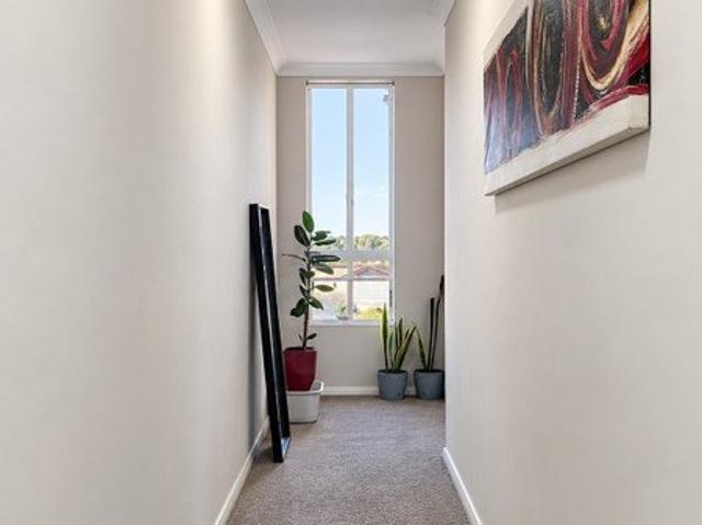 Top Floor Corner Apartment with Wraparound Balcony