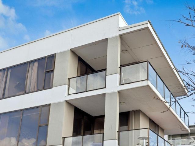 Top Floor Apartment Three Bedrooms with Wrap Around Balcony!
