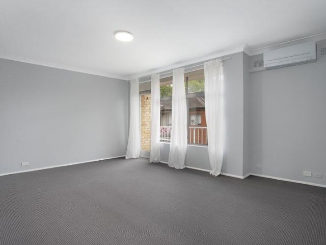Top Floor Apartment with Aircon & Carport