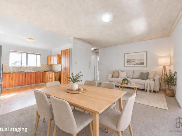Top floor apartment with lock up garage parking