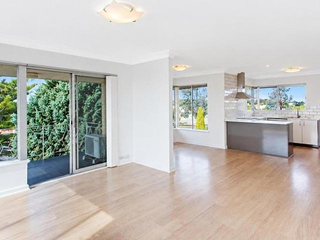 Top Floor Apartment with River and City Views
