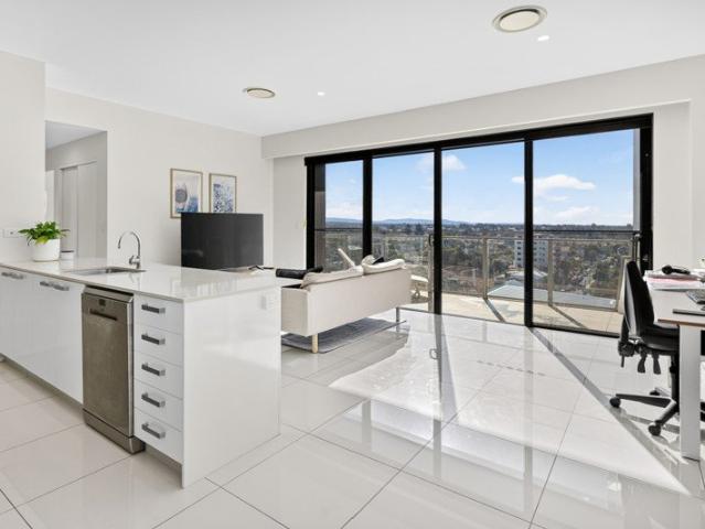Top Floor Boutique Living with Two Side by Side Car Spaces