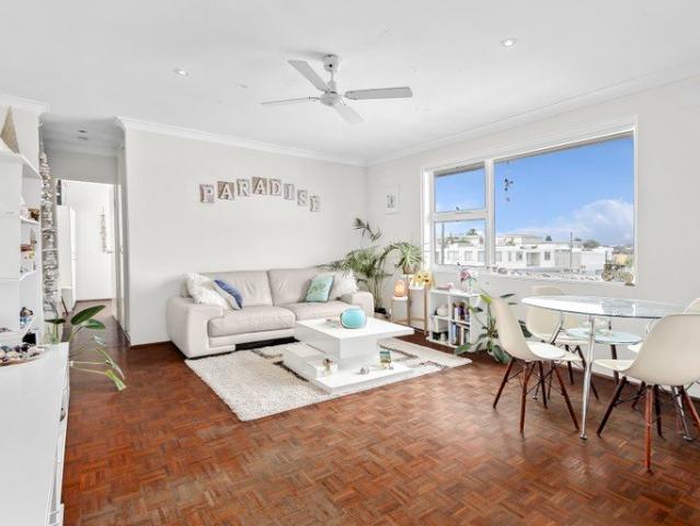 Top Floor Beachside Living With Ocean Views